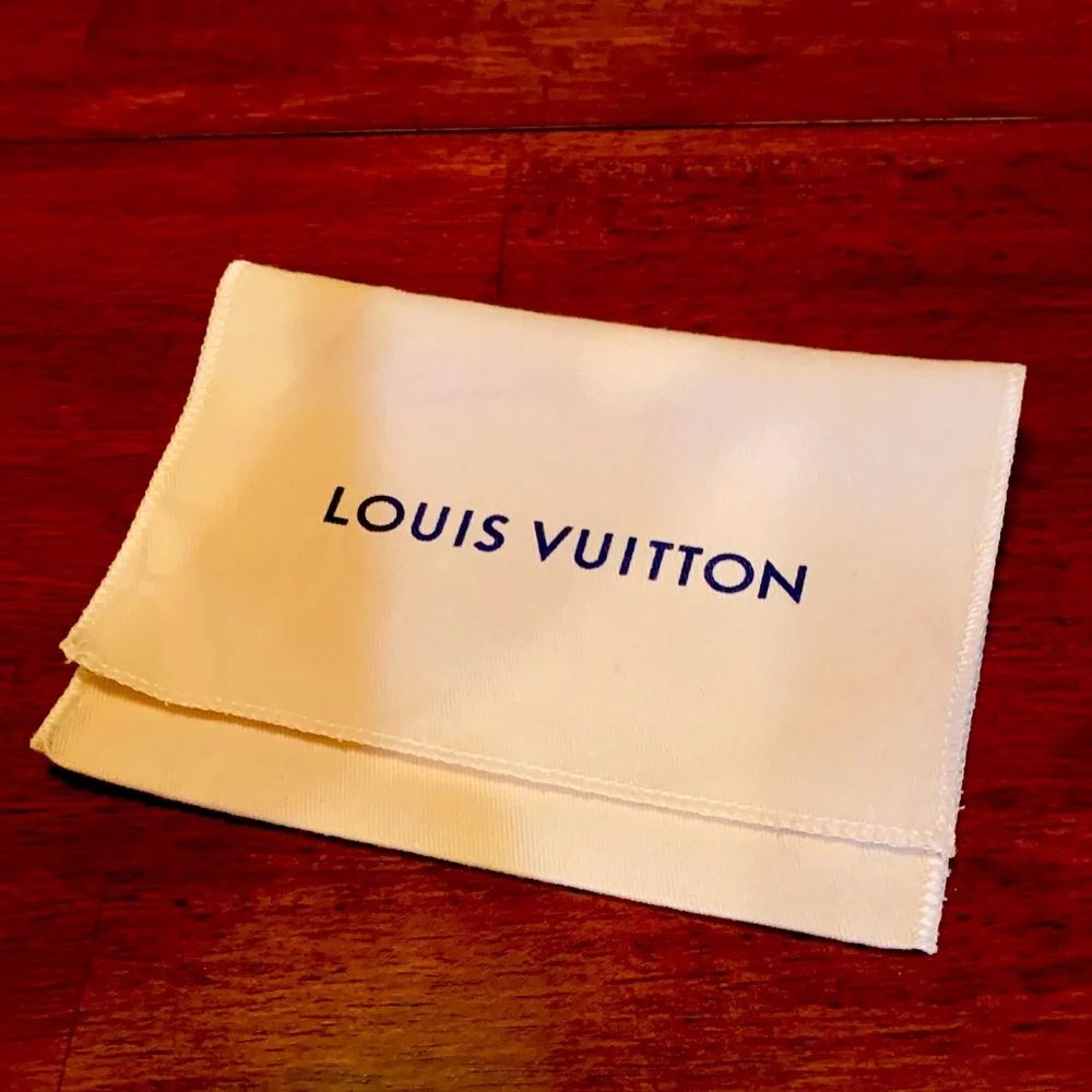 Authentic brand new Louis Vuitton Cream and Blue Dust Bag, small size, rare